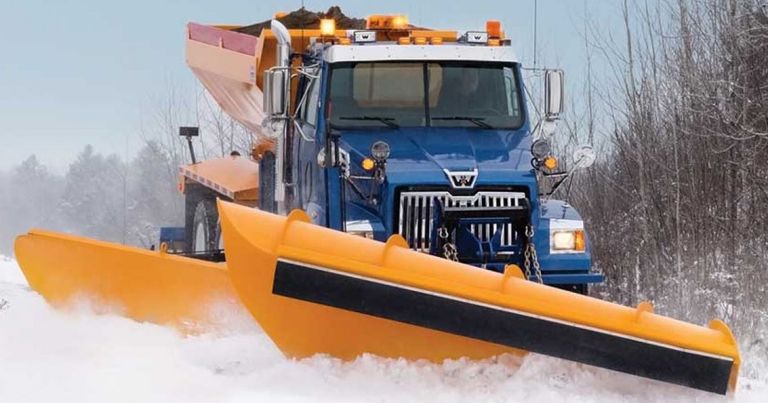 Front of a truck with a snow plow