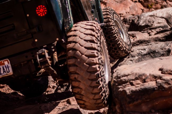 Close up of tires along rocks