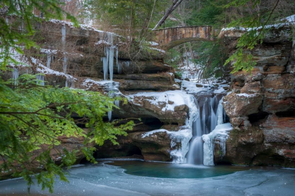 Upper Falls in Hocking Hills State Park covered by snow and ice