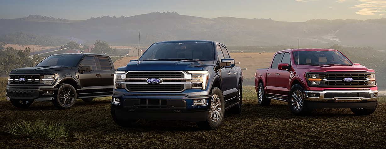 Three Ford F-150s parked next to each other