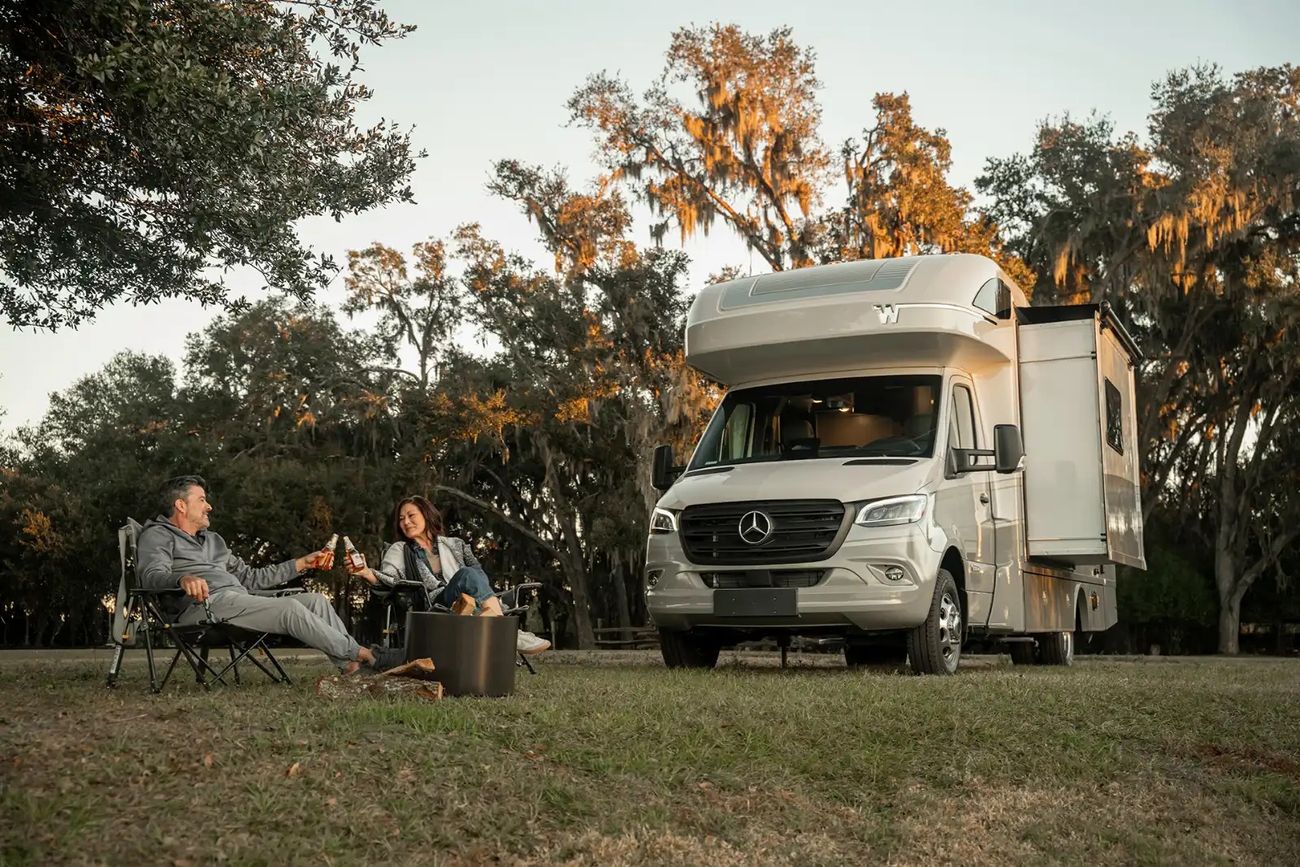 Class C RV in a campsite setting