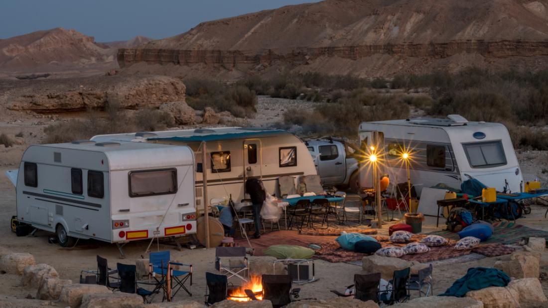 RVs parked together in the desert
