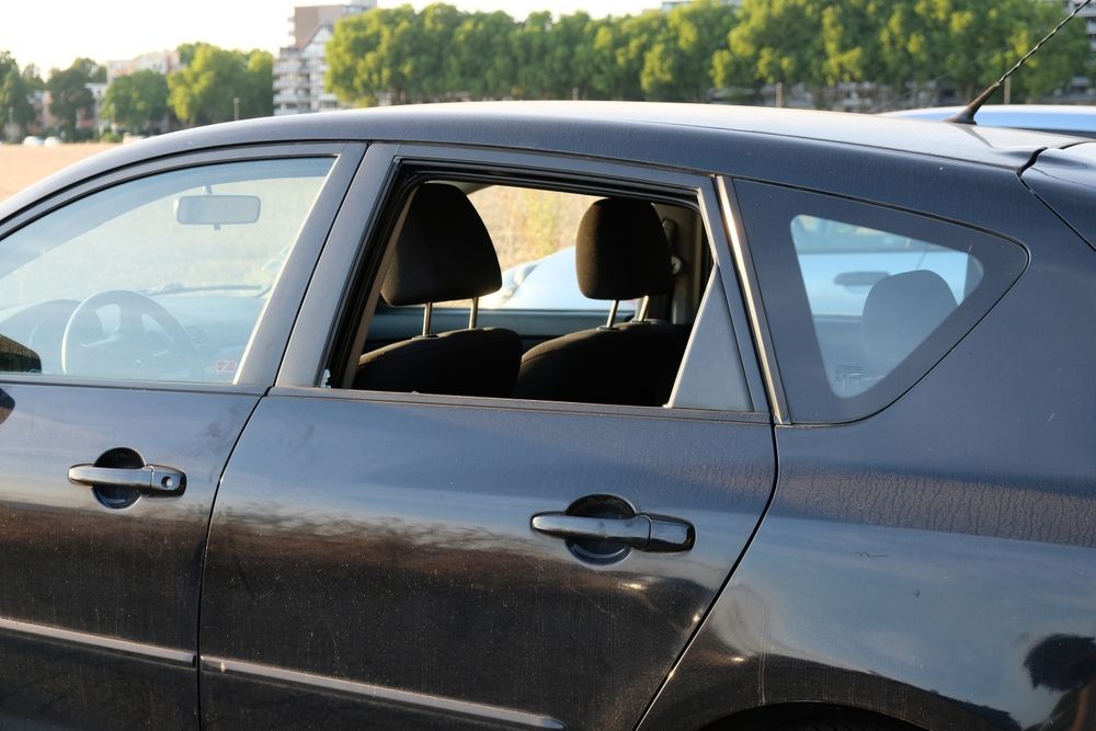 Open back window in a parked car