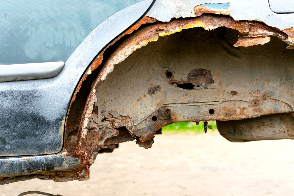 Close up of a rusted wheel well