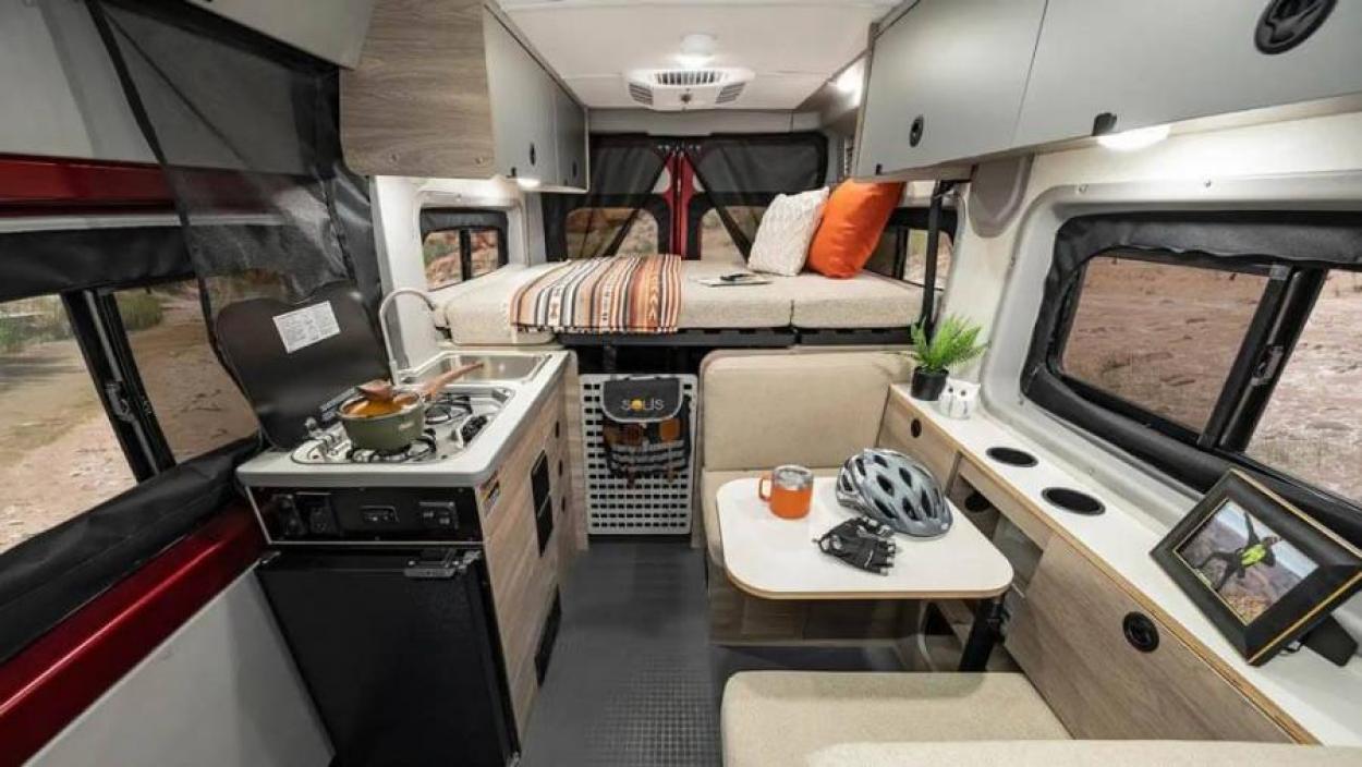 Interior of the Winnebago Solis with bed extended