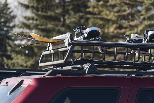 Roof rack with skis and snowboards