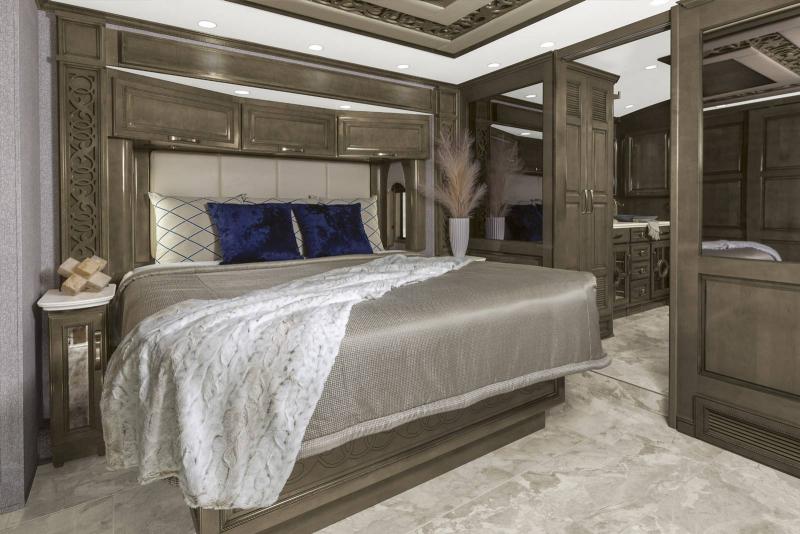 King bed inside the 2023 Newmar Essex Class A RV