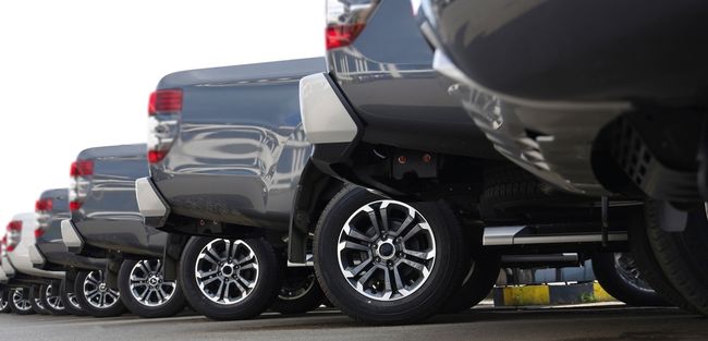 New grey trucks lined up