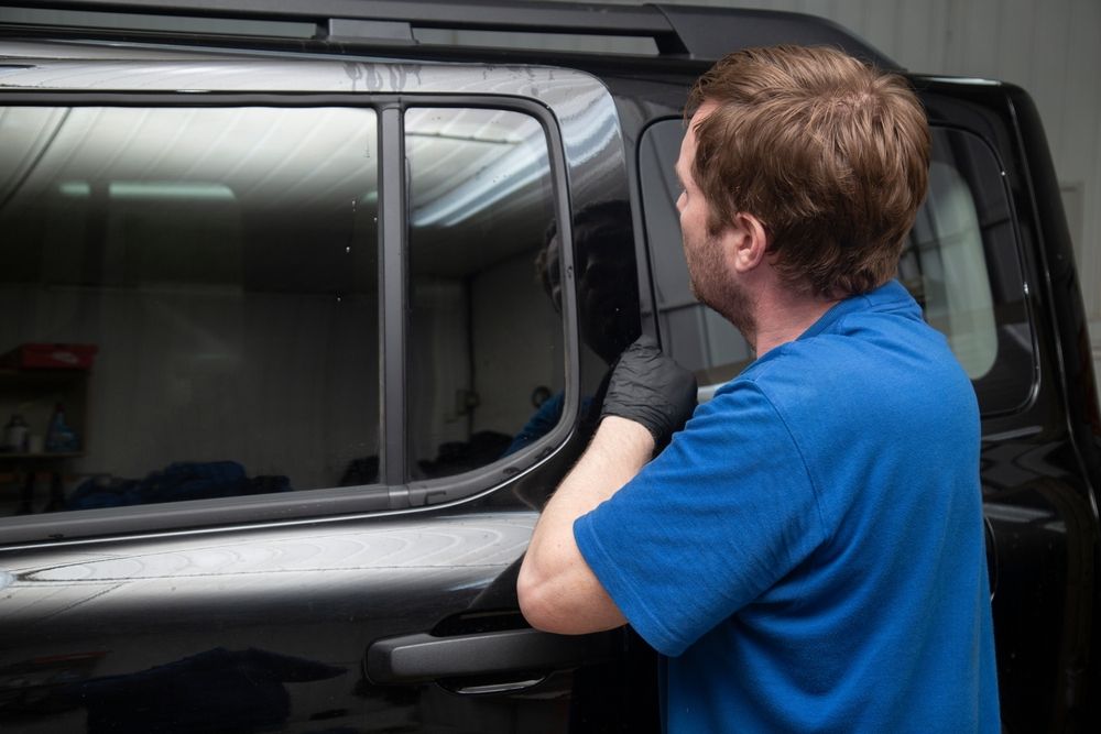 Auto worker tinting windows