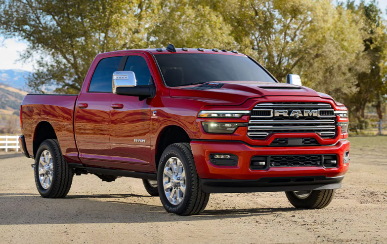  A red RAM 2500 parked in front of trees