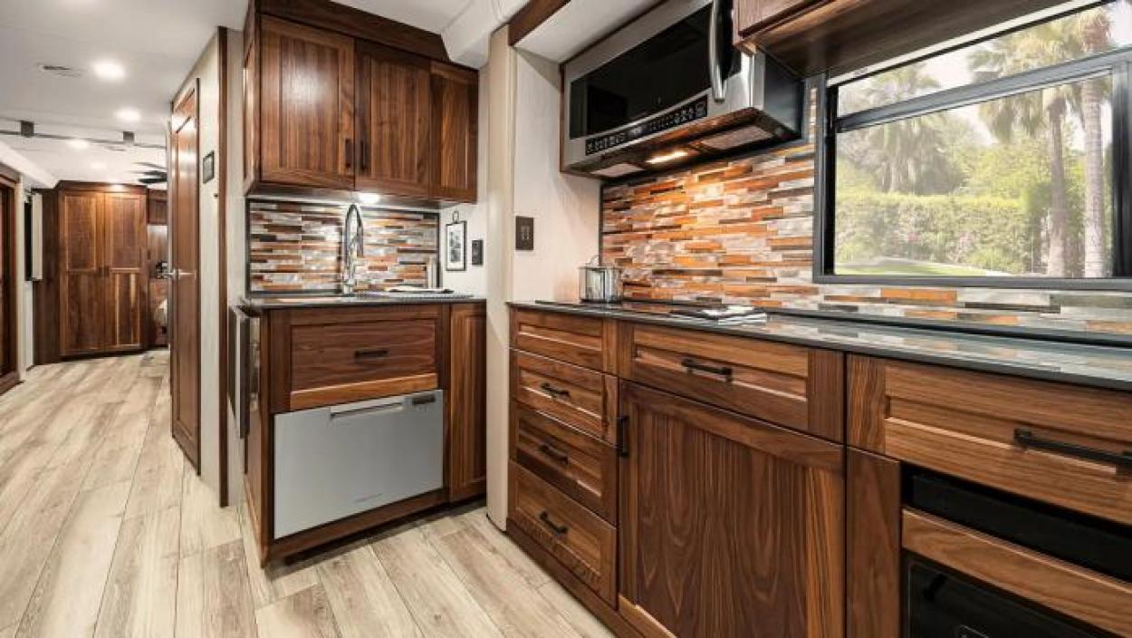 Dishwasher and kitchen area inside a Winnebago RV