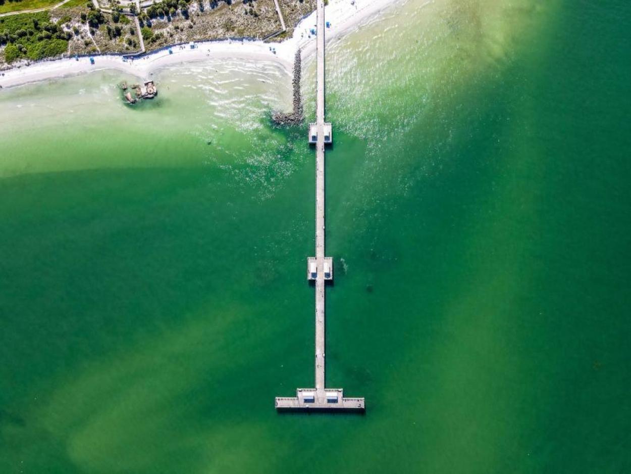 Aerial view of the pier on Fort De Soto County Beach in Florida
