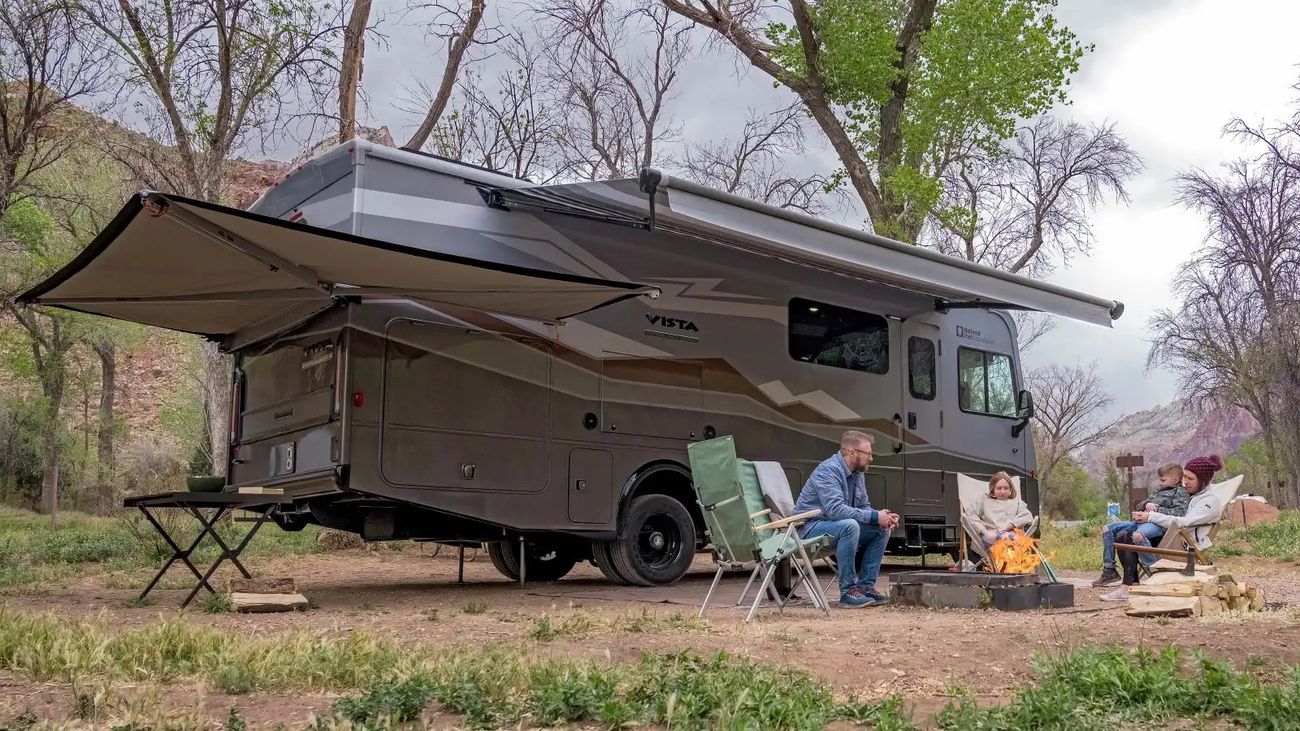 Family outside an RV