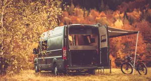 Camper in a forested area