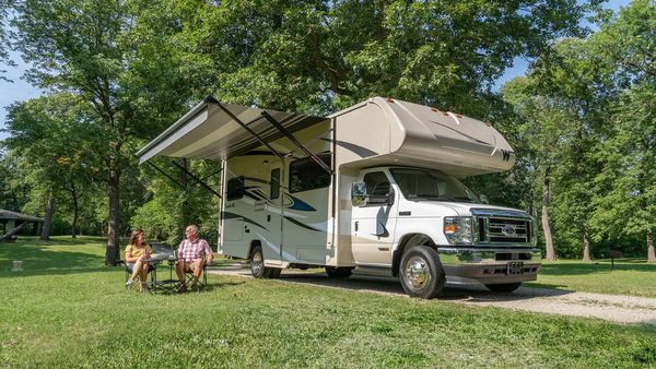 Exterior view of the Winnebago Spirit in a campground setting
