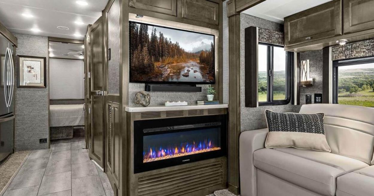 Inside of a Class A RV with a fireplace running