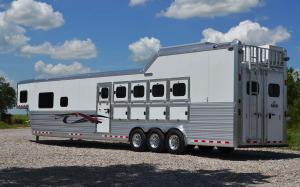Exterior of a large horse trailer unhitched