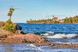 View across the water of Lake Superior of the lighthouse at Copper Harbor, Michigan