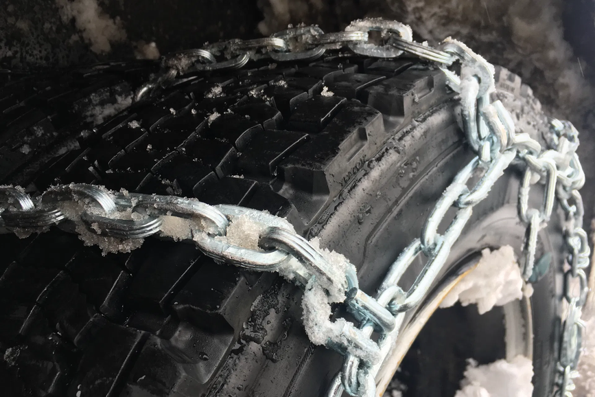 Truck tire with chains 