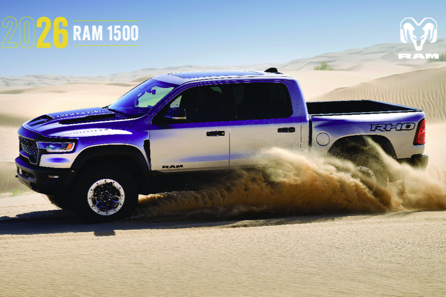 2026 RAM 1500 driving through sand dunes 