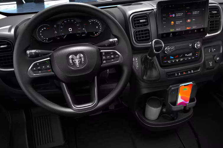  Interior of the 2026 RAM ProMaster Tradesman showing the digital cluster display and driver cockpit