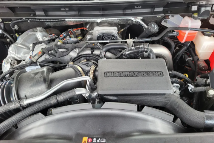 Duramax 6.6L Turbo-Diesel V8 engine in the 2026 GMC Sierra 2500HD Denali producing 470 horsepower and 975 lb-ft of torque at Transwest GMC Henderson CO
