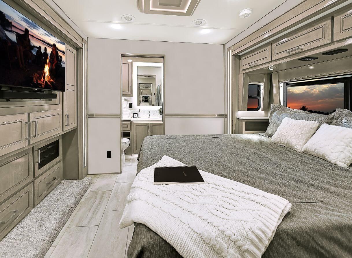 Bed and TV inside the 2025 Renegade XL