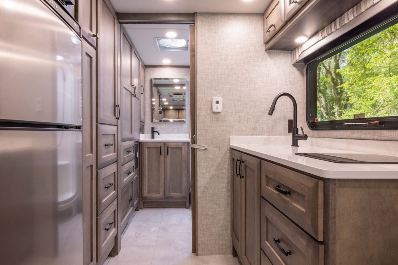 Ample cabinetry and a sink in the Tiffin Midas