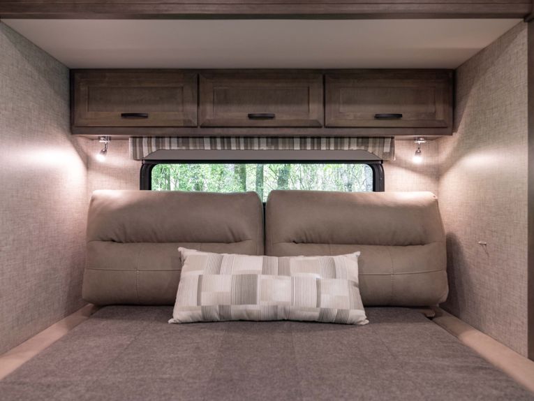 Bed and overhead cabinets 