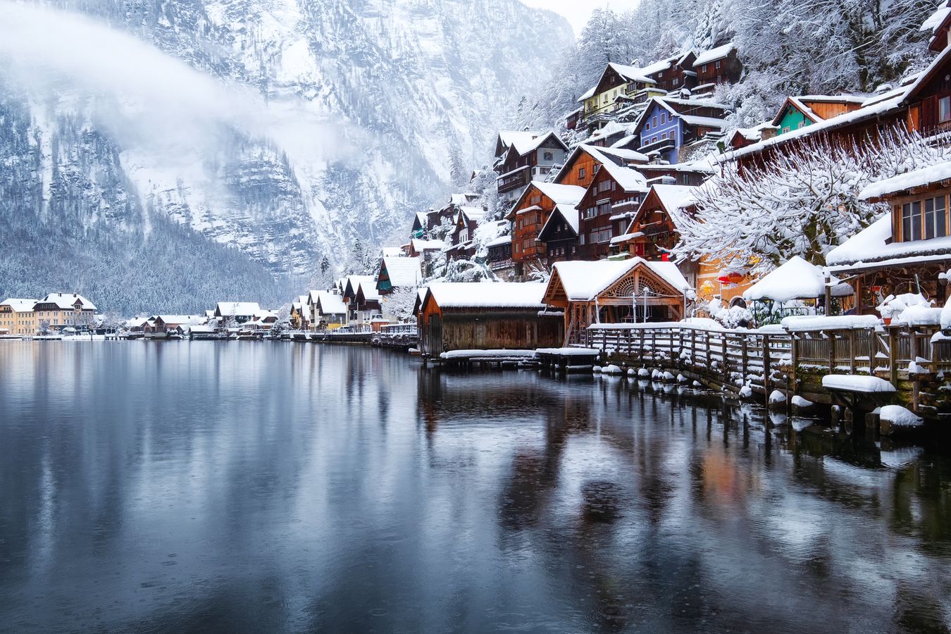 Winter village by lake