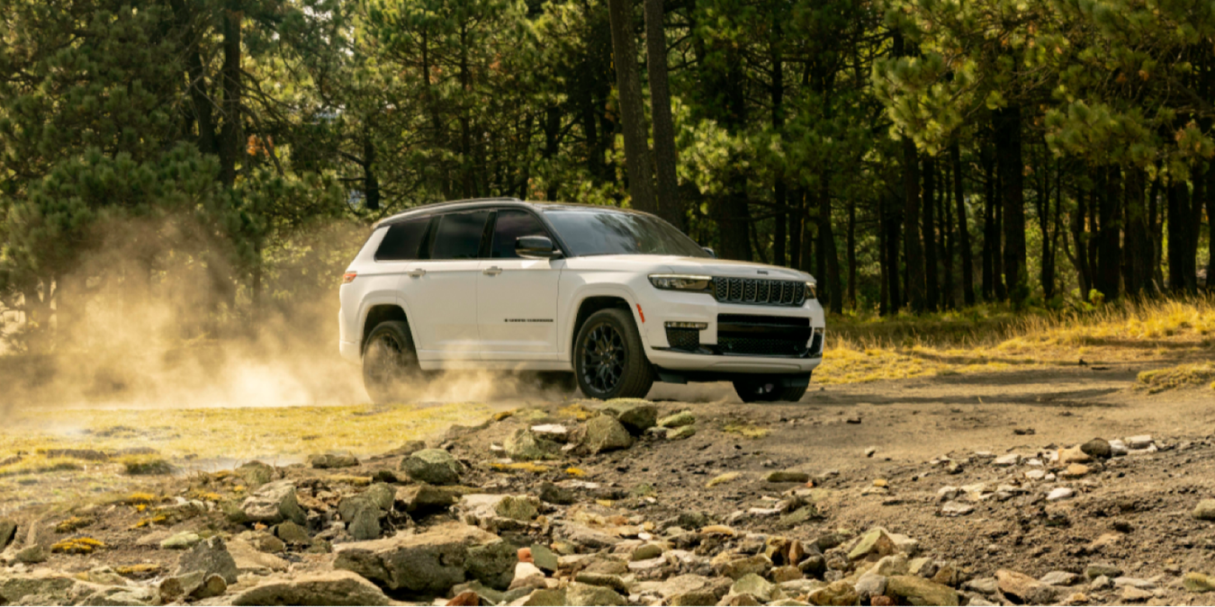 2025 Grand Cherokee L Altitude X driving through the wilderness