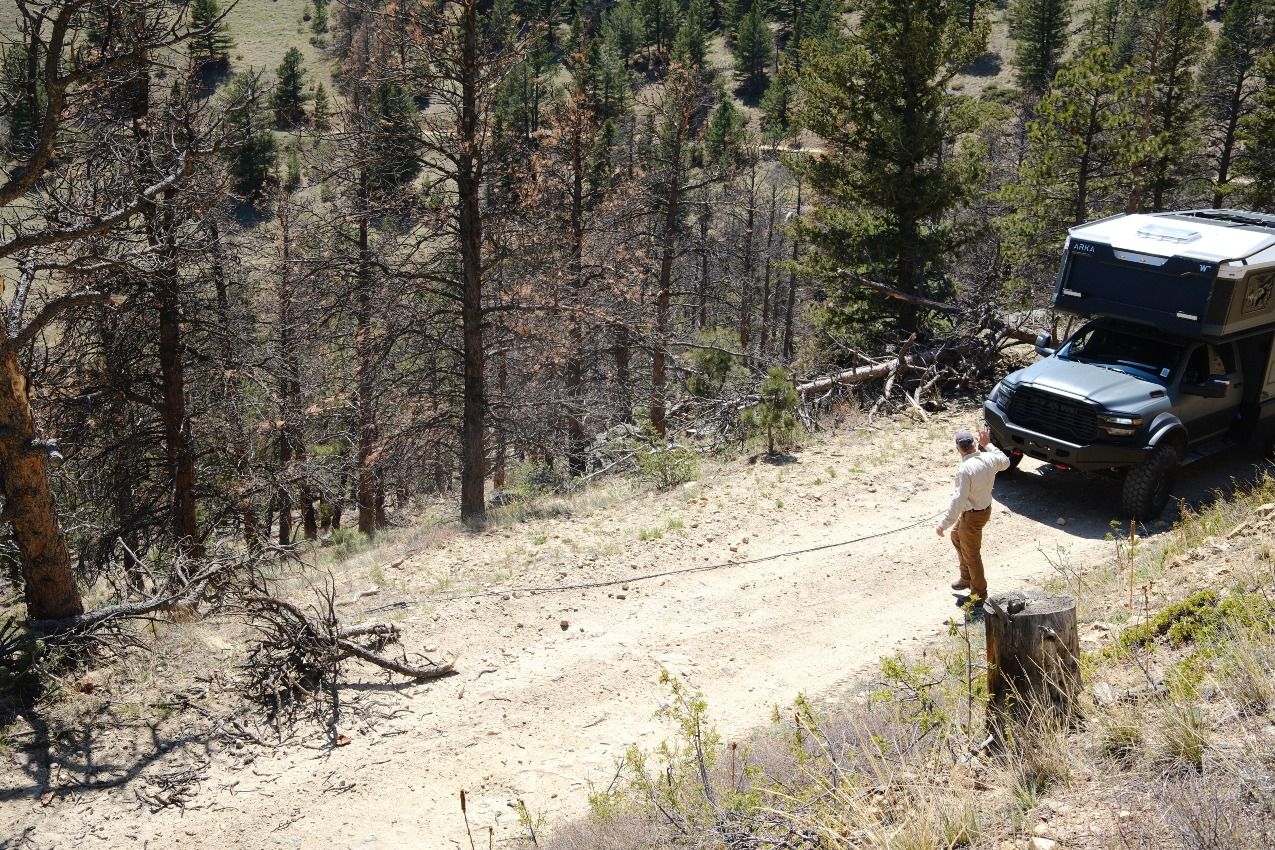 Pulling tree limbs off the trail with an ARKA