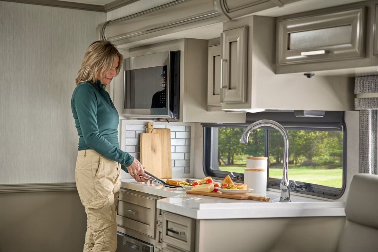 Woman in an RV kitchen