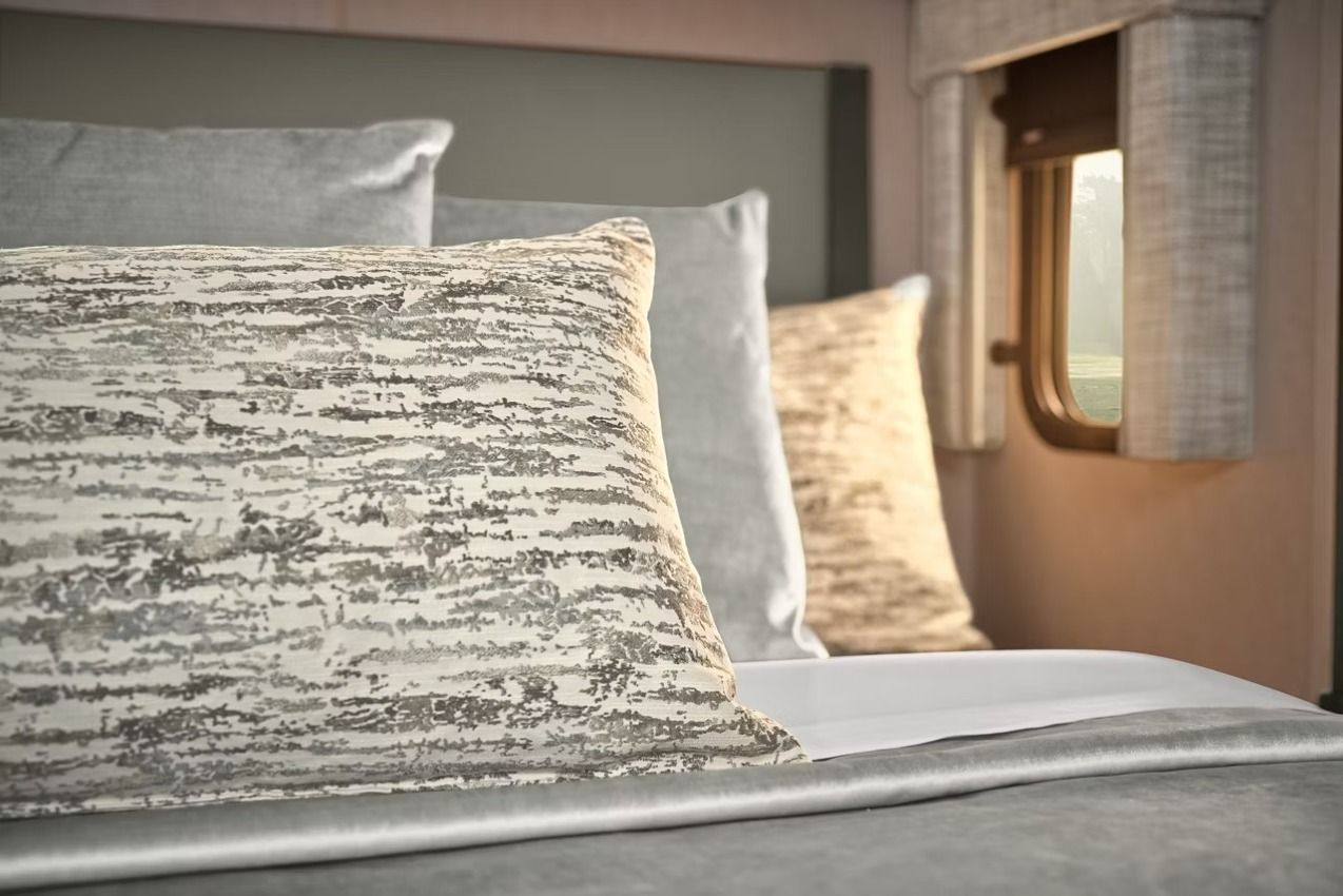 Northern Star pillows on bed