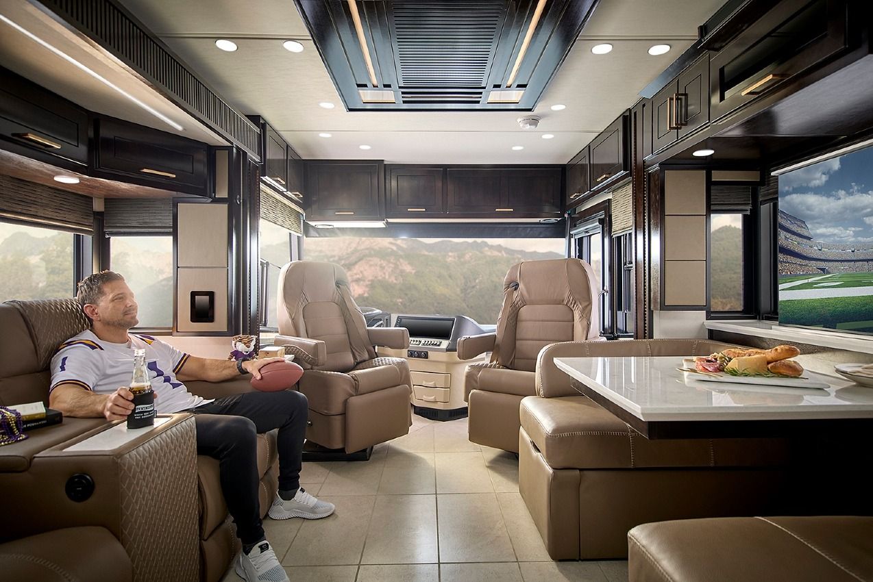 2027 Newmar New Aire living area with a person in a chair