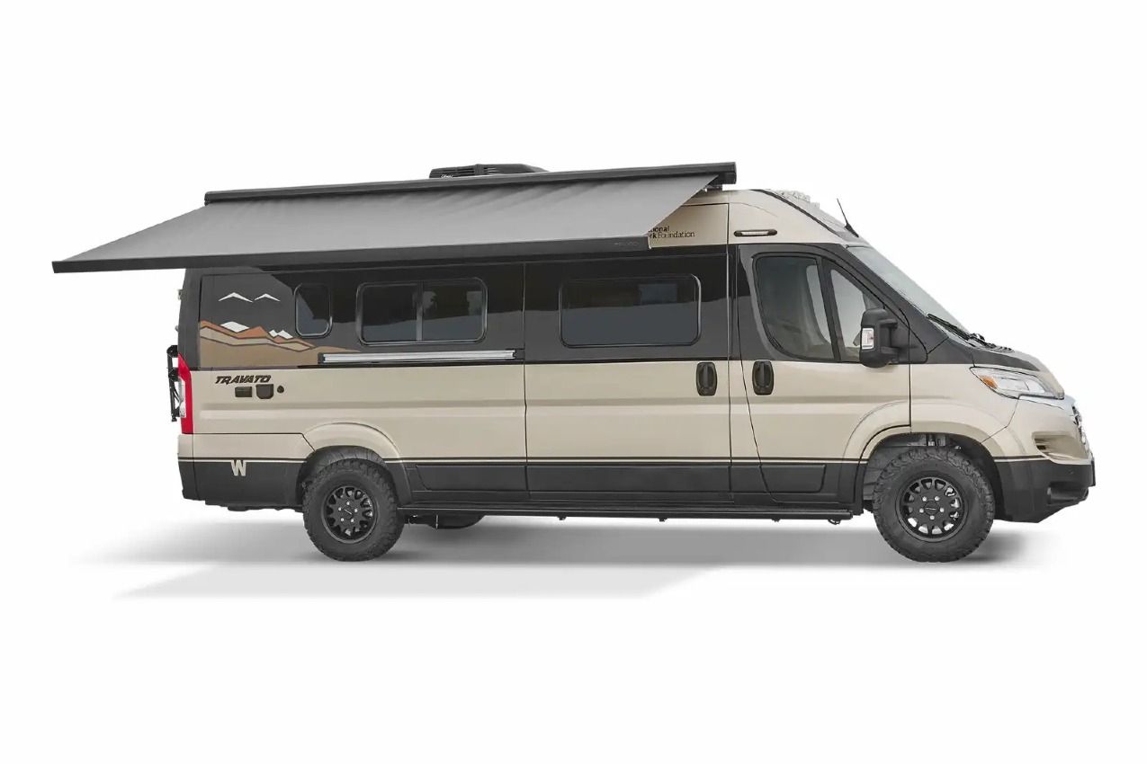 Side view of the Travato with awning up