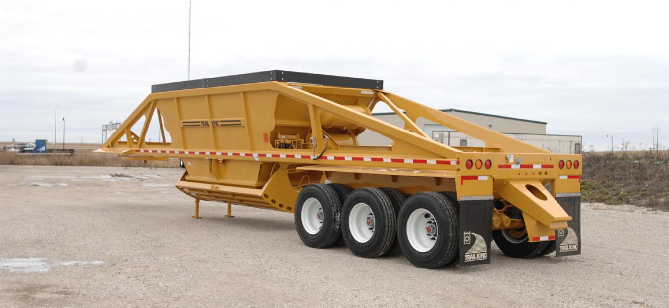 An exterior shot of a yellow Trail King trailer