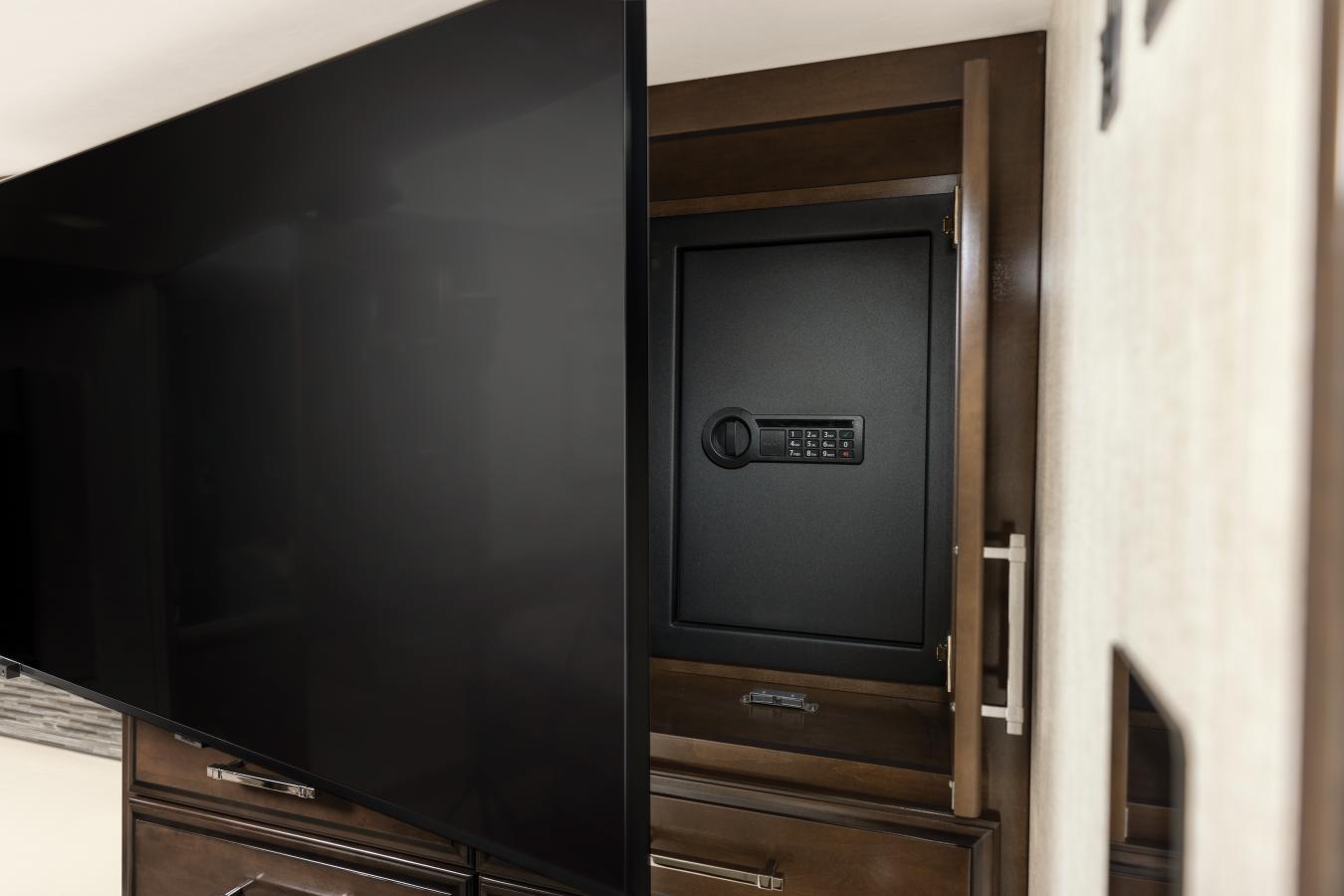 Safe behind a mounted television