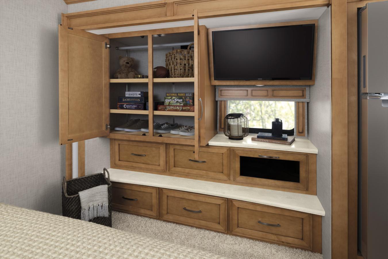 Open entertainment center in the bedroom of the Canyon Star