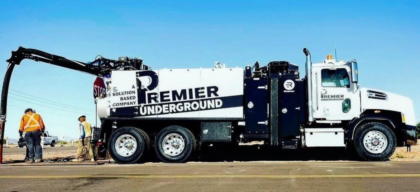 White branded Rival hydrovac truck being used in construction