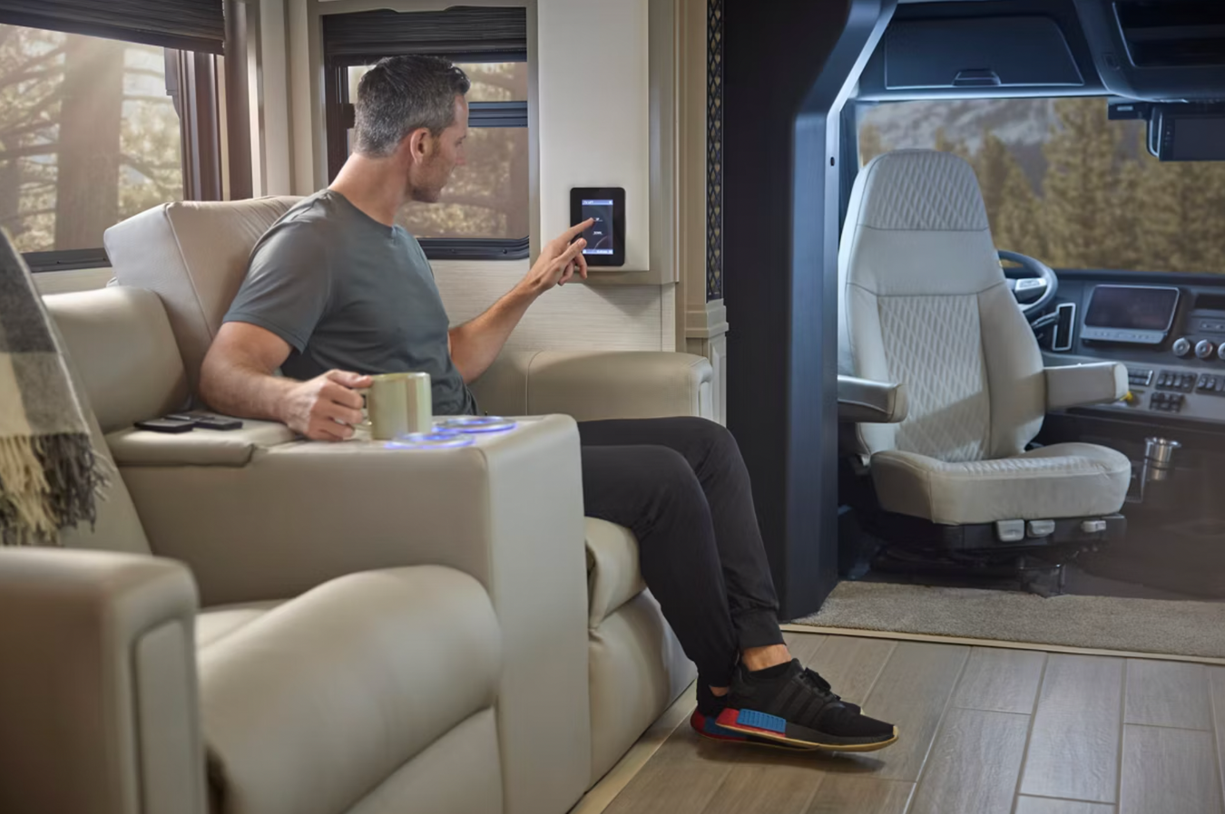 A man sits in the 2026 Summit Aire&#039;s theater seats