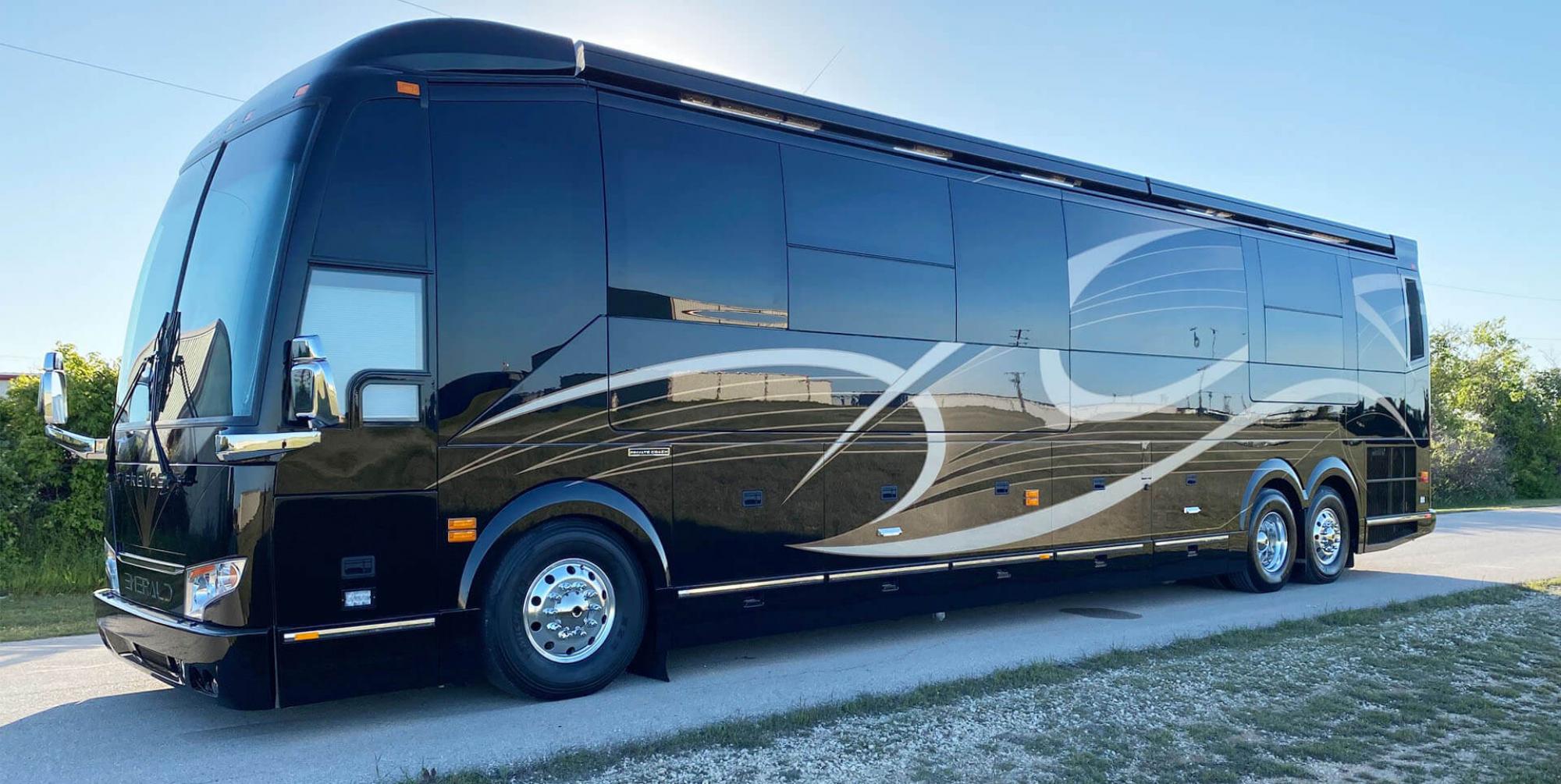 An exterior shot of an Emerald Luxury Coach RV