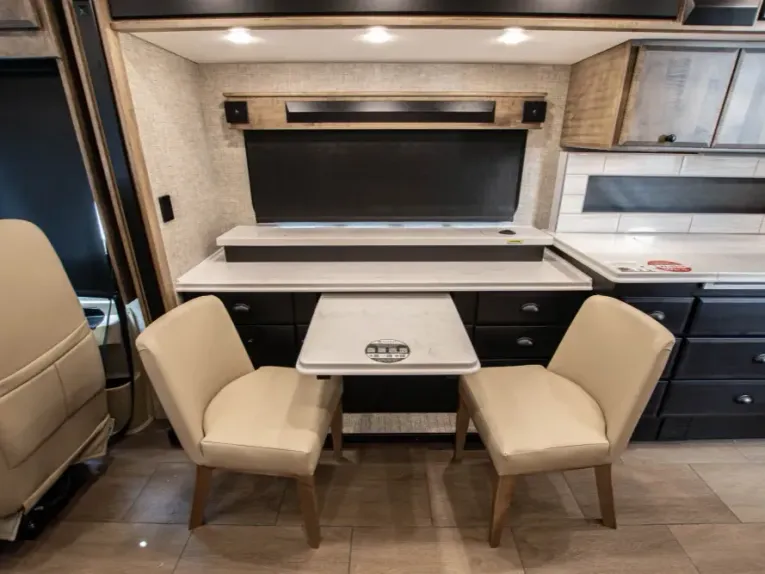 Seats and table in the 2026 Tiffin Allegro Breeze