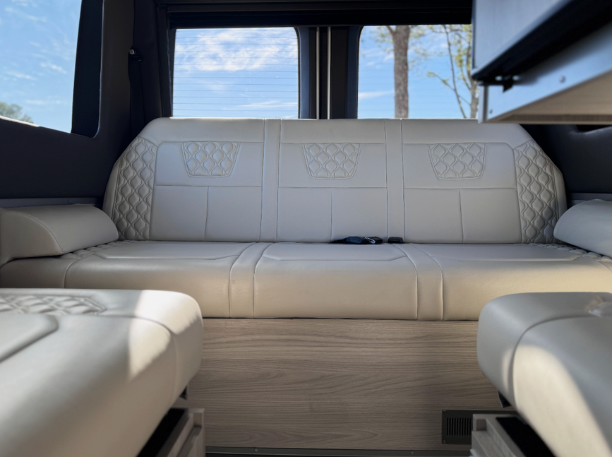 Interior image of the convertible queen-size bed inside the 2025 Tiffin GT1 