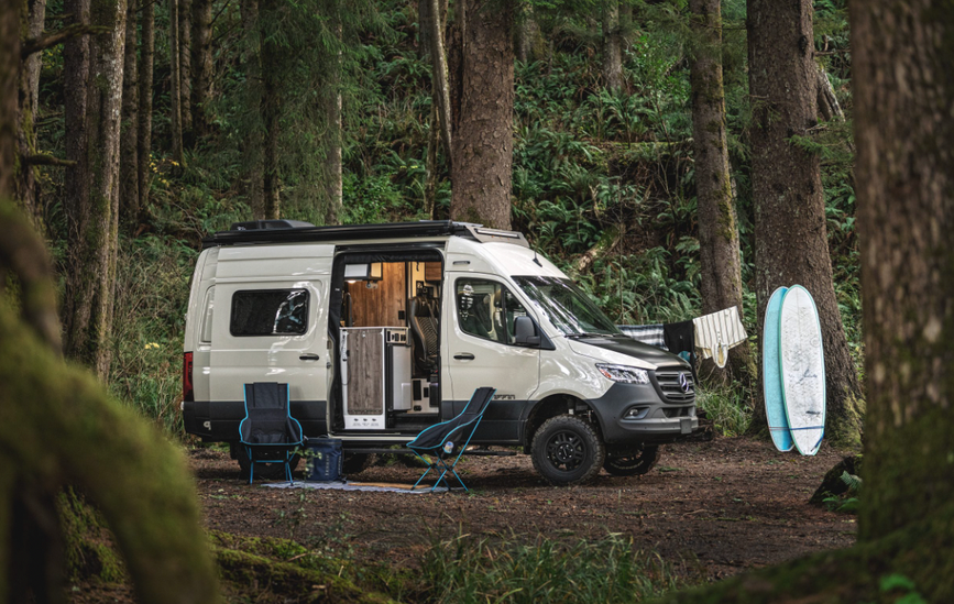 A 2025 Tiffin GH1 parked in a forest