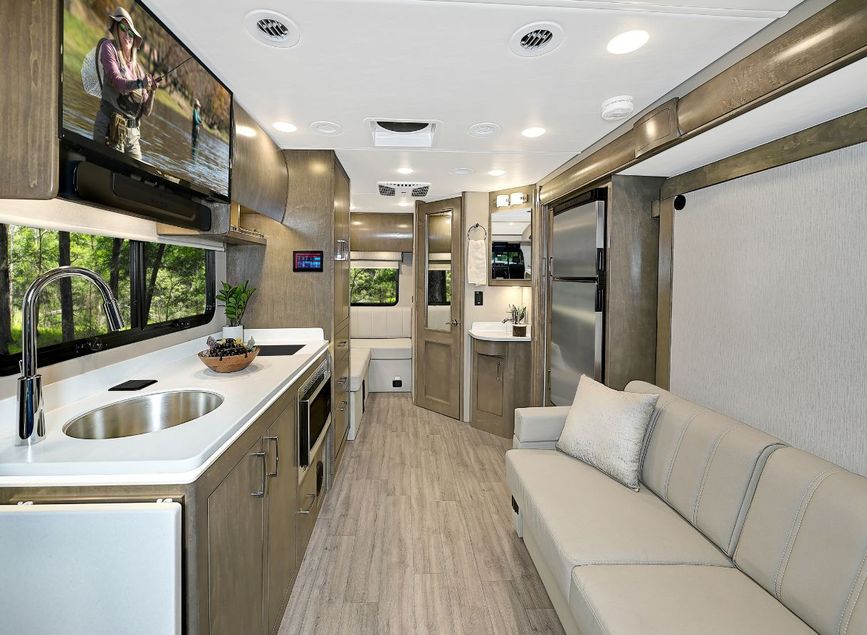 Inside image of the 2025 Renegade Vienna, showing a front to back view