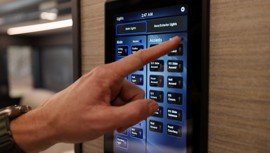 Image of a person using the  2025 Tiffin Zephyr touch control