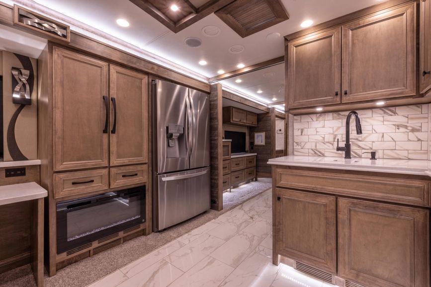 Interior image of the 2025 Tiffin Phaeton kitchen and sink