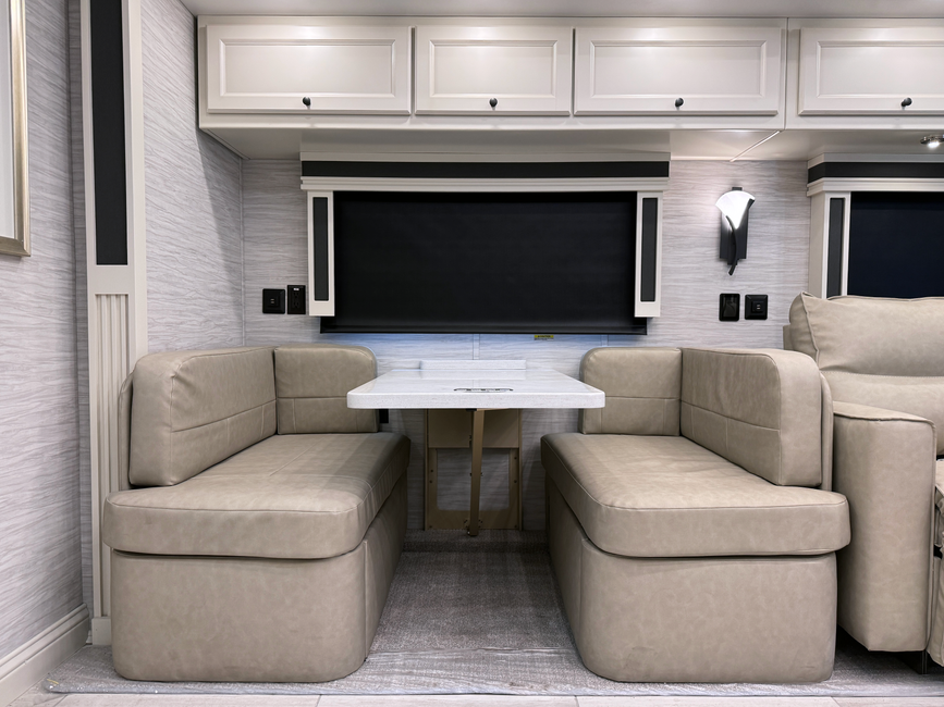 Dinette and overhead cabinetry in the Tiffin Allegro RED