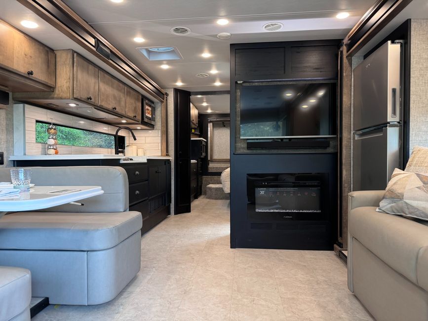 Inside image of the 2025 Tiffin Allegro Breeze showing the living area